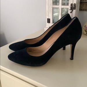 Black suede pumps